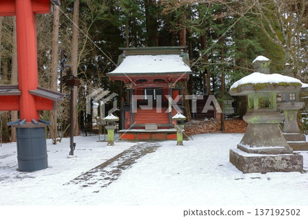 Kitaguchi Hongu Sengen Jinja Shrine in Fujiyoshida of Yamanashi Japan during the winter. This is the traditional Shinto entrance to the path to the summit of Mt. Fuji, and dates from the year 100AD 137192502