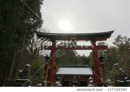 Fuji Otorii gate, mon, torii, at the Kitaguchi Hongu Fuji Sengen Jinja, shrine, on a snowy winter day in Fujiyoshida in Japan. The original gateway to the path to climb Mt. Fuji Fuji Otorii gate, mon, torii, at the Kitaguchi Hongu Fuji Sengen Jinja, shrine, on a snowy winter day in Fujiyoshida in Japan. The original gateway to the path to climb Mt. Fuji 137193594