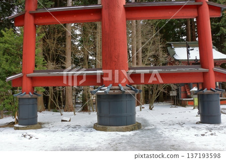 Fuji Otorii gate, mon, torii, at the Kitaguchi Hongu Fuji Sengen Jinja, shrine, on a snowy winter day in Fujiyoshida in Japan. The original gateway to the path to climb Mt. Fuji Fuji Otorii gate, mon, torii, at the Kitaguchi Hongu Fuji Sengen Jinja, shrine, on a snowy winter day in Fujiyoshida in Japan. The original gateway to the path to climb Mt. Fuji 137193598