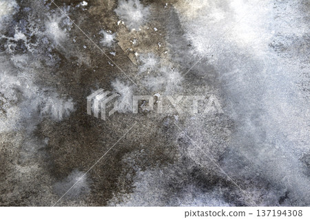 Abstract black and grey watercolour paint and ink swirling on white paper background to look like clouds and monochrome wash Abstract black and grey watercolour paint and ink swirling on white paper background to look like clouds and monochrome wash 137194308