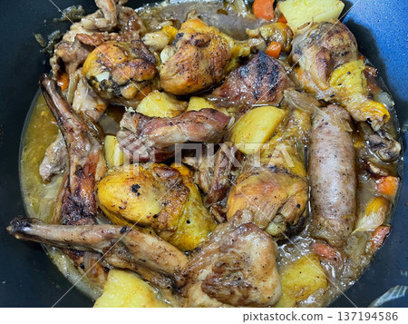 Rustic Roasted Meat with Chicken Rabbit and Butifarra Rustic Roasted Meat with Chicken Rabbit and Butifarra 137194586