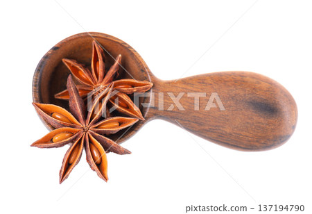 Star anise isolated on white background. Anise stars or badian spice in wooden spoon. Clipping path. Star anise isolated on white background. Anise stars or badian spice in wooden spoon. Clipping path. 137194790