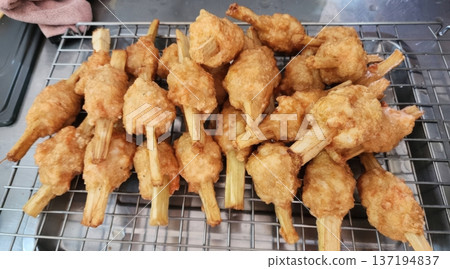 Vietnamese Fried Shrimp Paste wrapped on Lemongrass Skewers - Chao Tom Snack Vietnamese Fried Shrimp Paste wrapped on Lemongrass Skewers - Chao Tom Snack 137194837