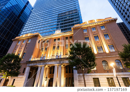Low-angle view of the Mitsubishi UFJ Trust and Banking Museum, situated in the Marunouchi business and financial district, Chiyoda, Tokyo, Japan. Low-angle view of the Mitsubishi UFJ Trust and Banking Museum, situated in the Marunouchi business and financial district, Chiyoda, Tokyo, Japan. 137197169