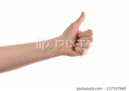 Young female right hand show thumbs up gesture isolated on white Young female right hand show thumbs up gesture isolated on white 137197960