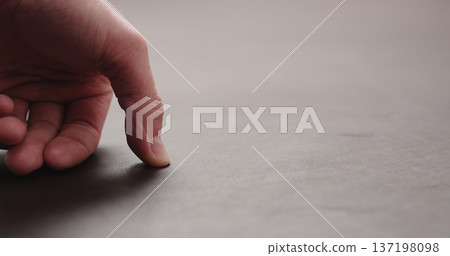 man hand checking brown leather piece closeup man hand checking brown leather piece closeup 137198098