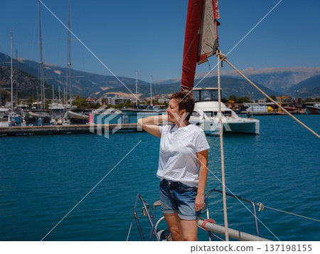 Woman Sailor Handling Sails Preparing For Navigation In Sea 137198155