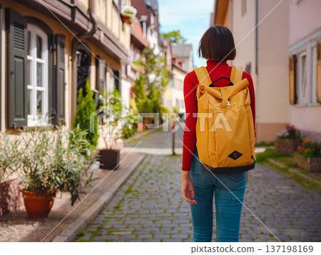 Tourist woman enjoys historic charm of Hochst near Frankfurt 137198169