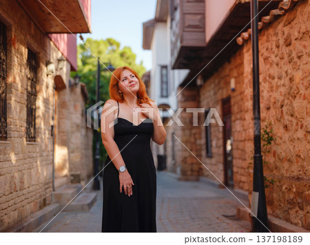 Young woman walking in old town, Antalya, Turkey 137198189