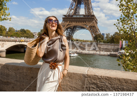 Fashionable Woman Enjoying Sunny Paris Landmark View 137198437