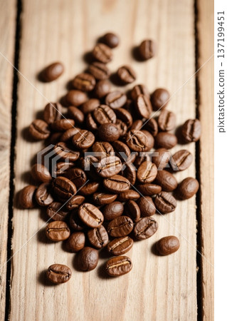 Coffee beans on a wooden table 137199451