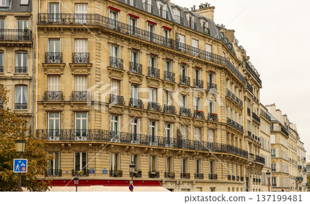 Classic Haussmann architecture in Paris, France, featuring historic residential buildings and ornate balconies 137199481