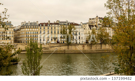 Paris architecture lining Seine River banks, reflecting European travel and autumn city exploring Paris architecture lining Seine River banks, reflecting European travel and autumn city exploring 137199482