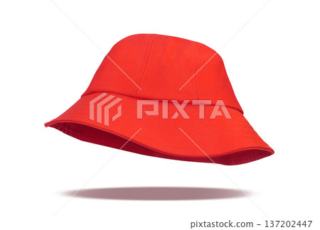 A red bucket hat floats stylishly against a white background. 137202447
