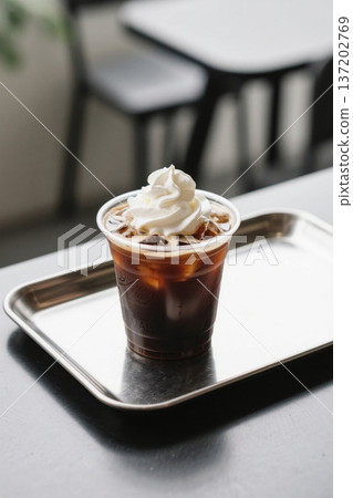 Iced coffee with cream on a tray 137202769