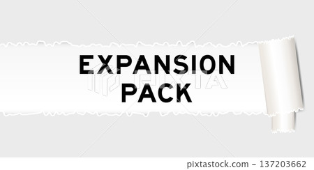Ripped gray paper background that have word expansion pack under torn part 137203662