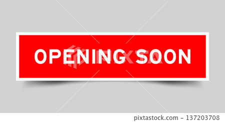 Red color square shape sticker label with word opening soon on gray background Red color square shape sticker label with word opening soon on gray background 137203708