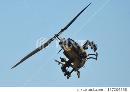 A Self-Defense Force military helicopter flying towards us A Self-Defense Force military helicopter flying towards us 137204568