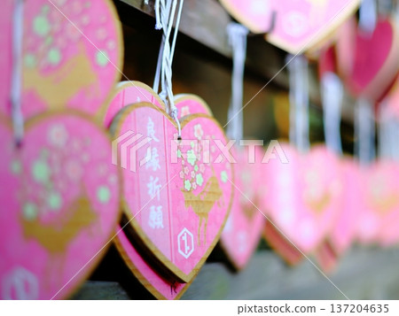Heart-shaped votive plaque for praying for a good marriage 137204635