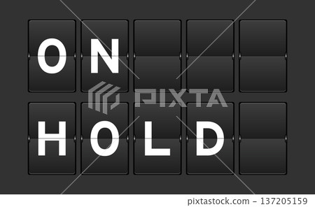Black color analog flip board with word on hold on gray background 137205159