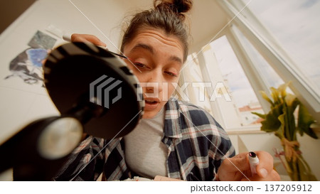 Person performing calming facial wash in peaceful bathroom environment Person performing calming facial wash in peaceful bathroom environment 137205912