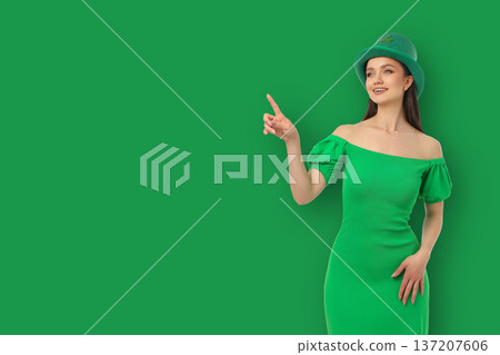 Woman in green dress celebrates St. Patrick's Day Woman in green dress celebrates St. Patrick's Day 137207606