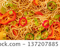 Hakka noodles with vegetables, peppers and green onions, overhead shot 137207885