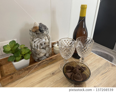 wine bottle with glasses and sweets bowl wine bottle with glasses and sweets bowl 137208539