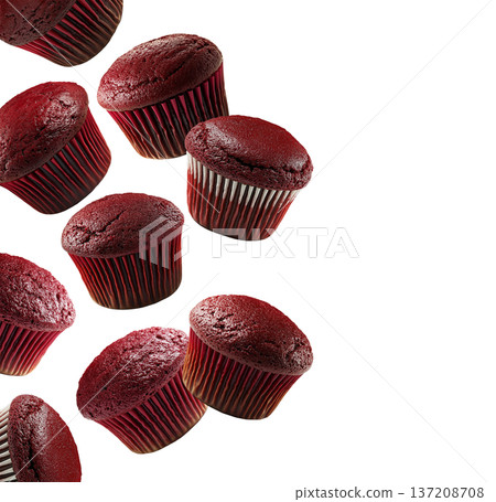 Multiple red velvet cupcakes randomly arranged, isolated on a white background. Concept of sweet dessert variety 137208708