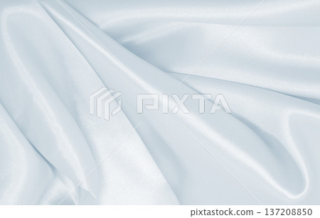 Smooth elegant grey silk or satin luxury cloth as wedding background. Luxurious background design Smooth elegant grey silk or satin luxury cloth as wedding background. Luxurious background design 137208850