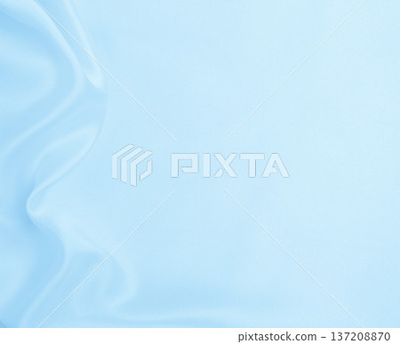 Smooth elegant blue silk or satin luxury cloth texture as abstract background. Luxurious background design Smooth elegant blue silk or satin luxury cloth texture as abstract background. Luxurious background design 137208870