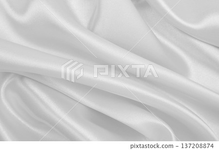 Smooth elegant white silk or satin luxury cloth texture as wedding background. Luxurious background design 137208874