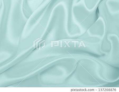 Smooth elegant blue silk or satin luxury cloth texture as abstract background. Luxurious background design Smooth elegant blue silk or satin luxury cloth texture as abstract background. Luxurious background design 137208876