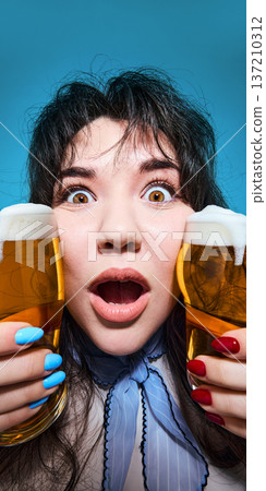 Surprised woman holding two glasses of light beer close up portrait. Surprised woman holding two glasses of light beer close up portrait. 137210312