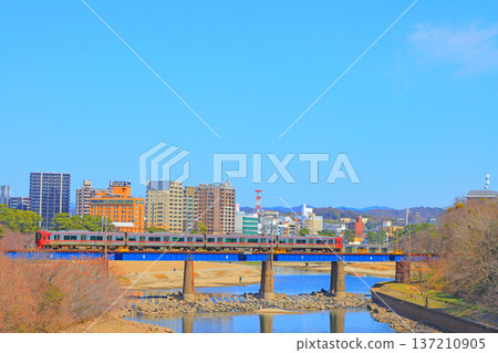 Okazaki City, Aichi Prefecture, scenery of the townscape of Okazaki City and Meitetsu train Okazaki City, Aichi Prefecture, scenery of the townscape of Okazaki City and Meitetsu train 137210905
