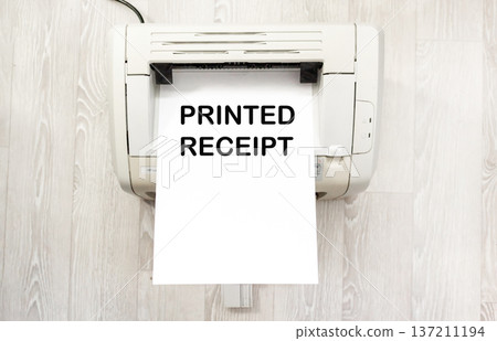 A printer with paper on the printed text Printed Receipt on it 137211194