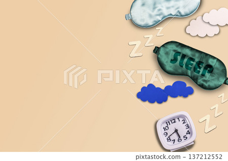 Composition of sleeping mask, alarm and clouds on colorful background. World sleep day concept 137212552
