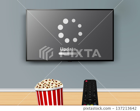 Update progress on tv screen. Popcorn and remote control in front of tv screen. Watching online tv with remote control and popcorn striped box. Update progress on tv screen. Popcorn and remote control in front of tv screen. Watching online tv with remote control and popcorn striped box. 137213642