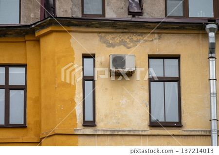 air conditioning on facade of building, air cooling in hot weather.  137214013