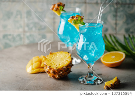 Boozy Blue Hawaii Cocktail Boozy Blue Hawaii Cocktail 137215894