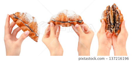 Chocolate Filled Croissant in Female Hands Isolated on White 137216196