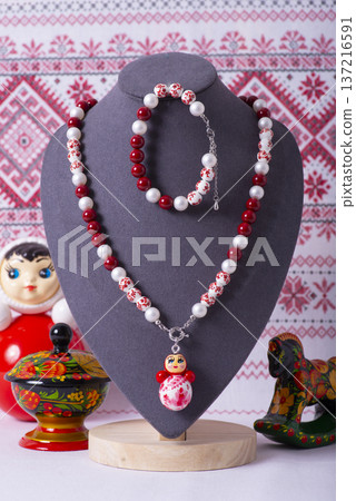 Russian symbols matryoshka, balalaika, rubles cash and flag of russian federation on wooden background. Russian symbols matryoshka, balalaika, rubles cash and flag of russian federation on wooden background. 137216591