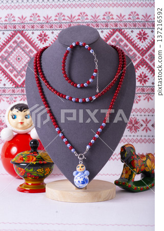 Russian symbols matryoshka, balalaika, rubles cash and flag of russian federation on wooden background. 137216592