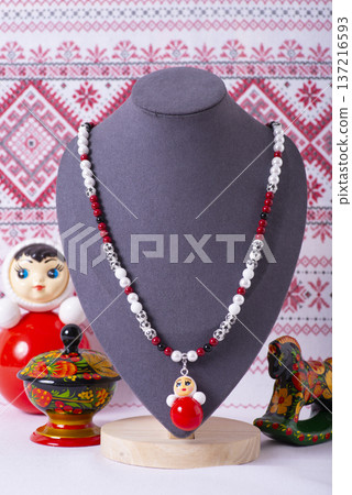 Russian symbols matryoshka, balalaika, rubles cash and flag of russian federation on wooden background. 137216593