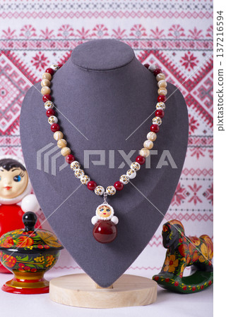 Russian symbols matryoshka, balalaika, rubles cash and flag of russian federation on wooden background. 137216594