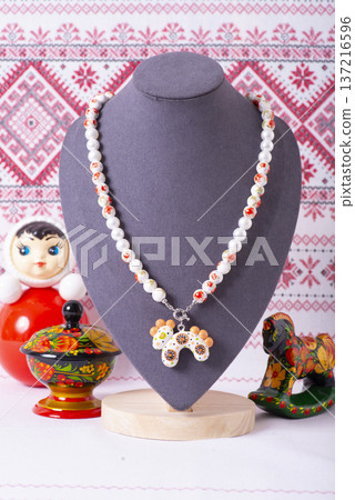Russian symbols matryoshka, balalaika, rubles cash and flag of russian federation on wooden background. Russian symbols matryoshka, balalaika, rubles cash and flag of russian federation on wooden background. 137216596