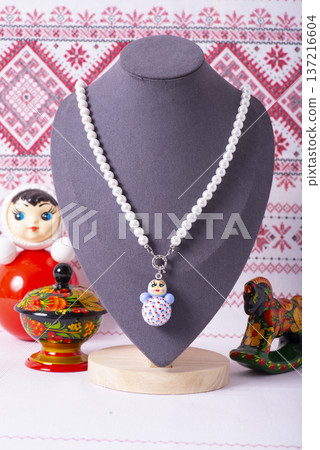 Russian symbols matryoshka, balalaika, rubles cash and flag of russian federation on wooden background. 137216604