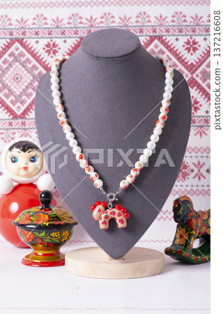 Russian symbols matryoshka, balalaika, rubles cash and flag of russian federation on wooden background. Russian symbols matryoshka, balalaika, rubles cash and flag of russian federation on wooden background. 137216608