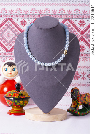Russian symbols matryoshka, balalaika, rubles cash and flag of russian federation on wooden background. Russian symbols matryoshka, balalaika, rubles cash and flag of russian federation on wooden background. 137216614