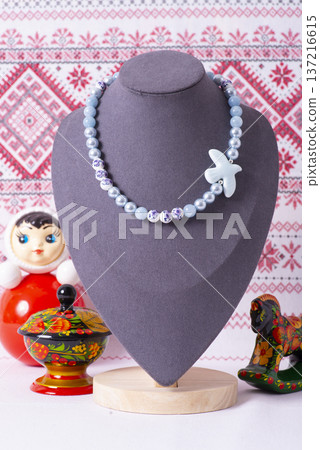 Russian symbols matryoshka, balalaika, rubles cash and flag of russian federation on wooden background. 137216615